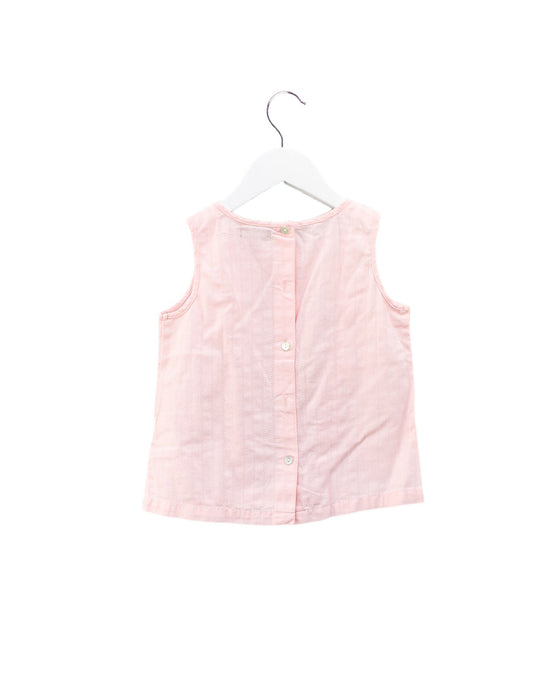 A Pink Sleeveless Tops from Periwinkle in size 6T for girl. (Back View)