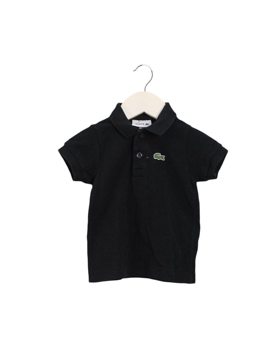 A Black Short Sleeve Polos from Lacoste in size 6-12M for boy. (Front View)