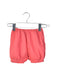 A Red Shorts from Chateau de Sable in size 3-6M for neutral. (Front View)