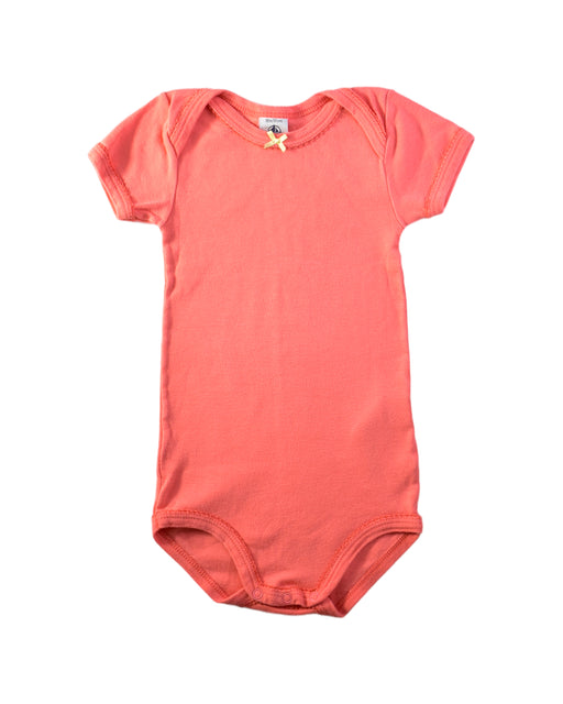 A Pink Short Sleeve Bodysuits from Petit Bateau in size 12-18M for girl. (Front View)