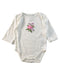 A White Long Sleeve Bodysuits from Guess in size 3-6M for girl. (Front View)