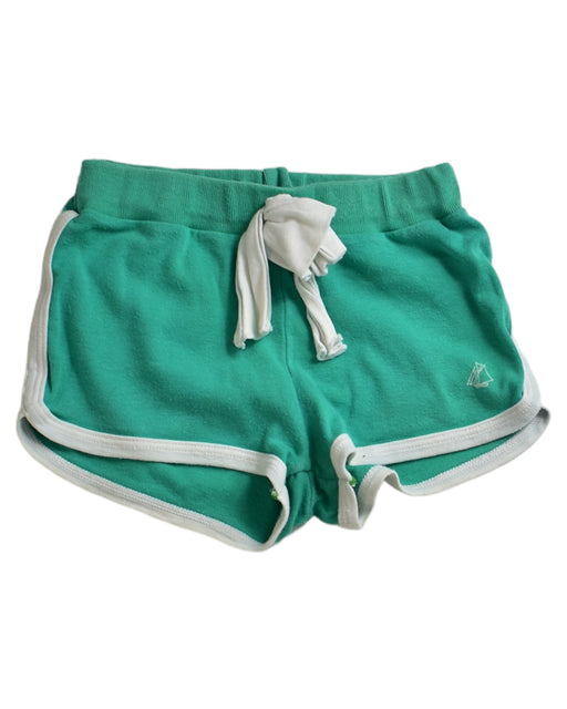 A Green Shorts from Petit Bateau in size 4T for girl. (Front View)