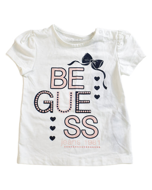 A White Short Sleeve T Shirts from Guess in size 12-18M for girl. (Front View)