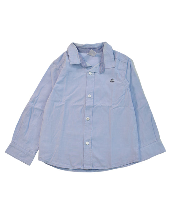 A Blue Shirts from Petit Bateau in size 4T for boy. (Front View)