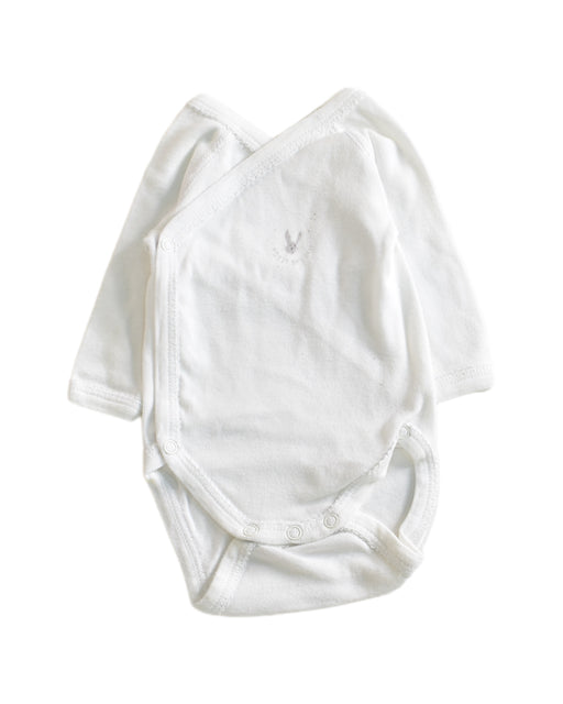 A White Long Sleeve Bodysuits from Petit Bateau in size Newborn for neutral. (Front View)