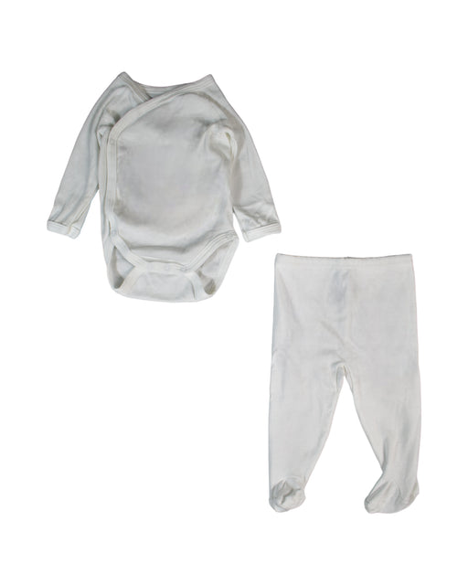 A White Long Sleeve Bodysuits from Petit Bateau in size 0-3M for girl. (Front View)