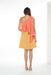 A Yellow Sleeveless Dresses from Bohn Fabulous in size S for maternity. (Back View)