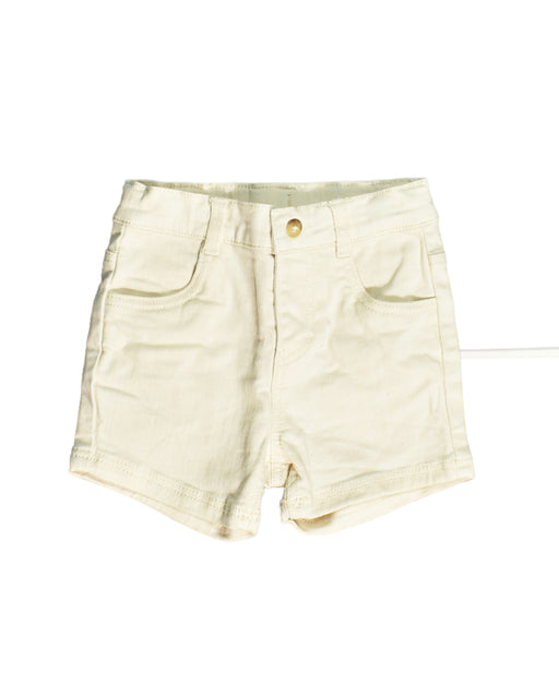 A Yellow Shorts from Petit Bateau in size 3-6M for girl. (Front View)