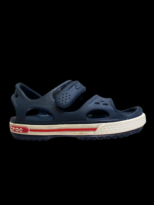 A Blue Sandals from Crocs in size 12-18M for boy. (Front View)