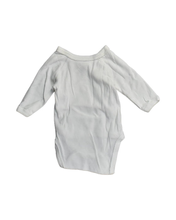 A White Bodysuits from Petit Bateau in size Newborn for neutral. (Back View)