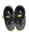 A Black Sneakers from Nike in size 5T for boy. (Back View)