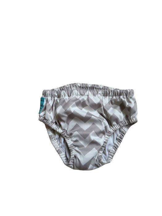 A White Swim Diapers from Charlie Banana in size 6-12M for neutral. (Front View)