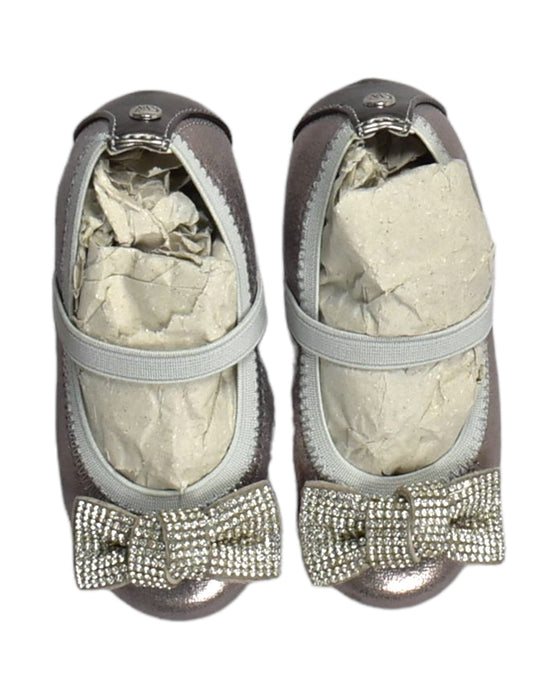 A Metallic Flats from Stuart Weitzman in size 12-18M for girl. (Back View)