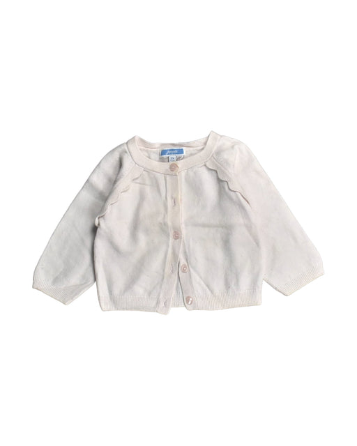 A White Cardigans from Jacadi in size 6-12M for girl. (Front View)