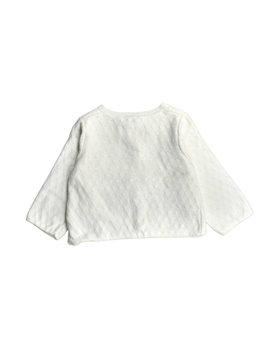 A White Cardigans from Natalys in size 6-12M for girl. (Back View)