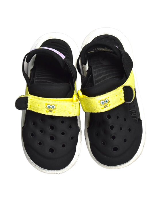 A Black Sandals from Puma in size 18-24M for boy. (Back View)