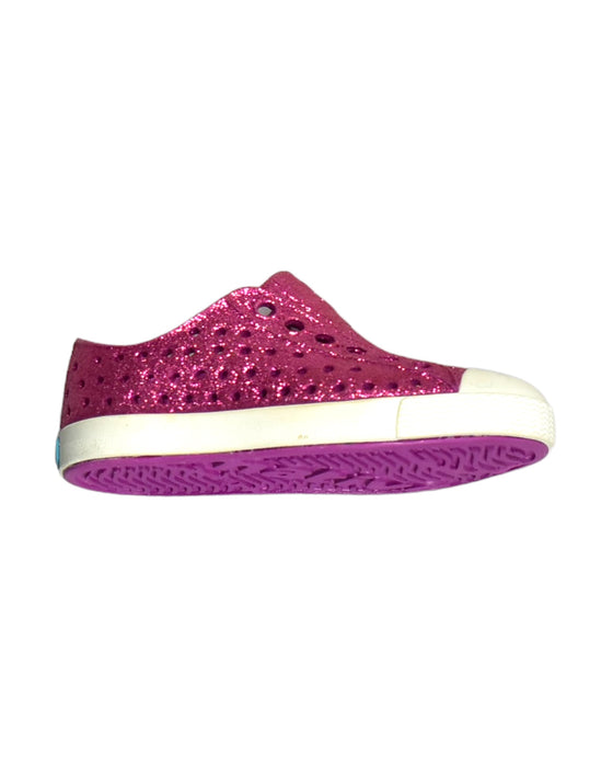 A Pink Slip Ons from Native Shoes in size 12-18M for girl. (Front View)