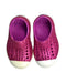 A Pink Slip Ons from Native Shoes in size 12-18M for girl. (Back View)