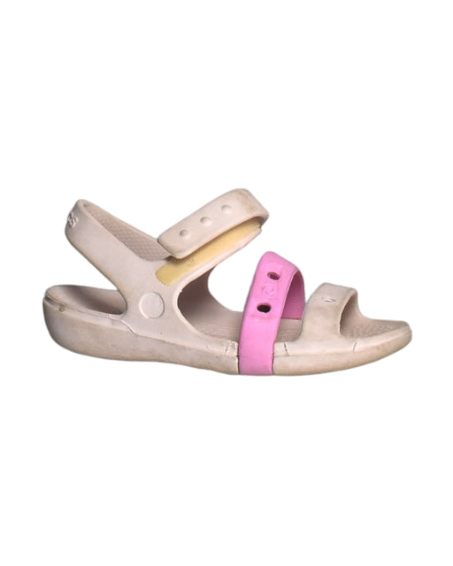 A Pink Sandals from Crocs in size 5T for girl. (Front View)