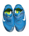 A Blue Sneakers from Nike in size 9Y for boy. (Back View)