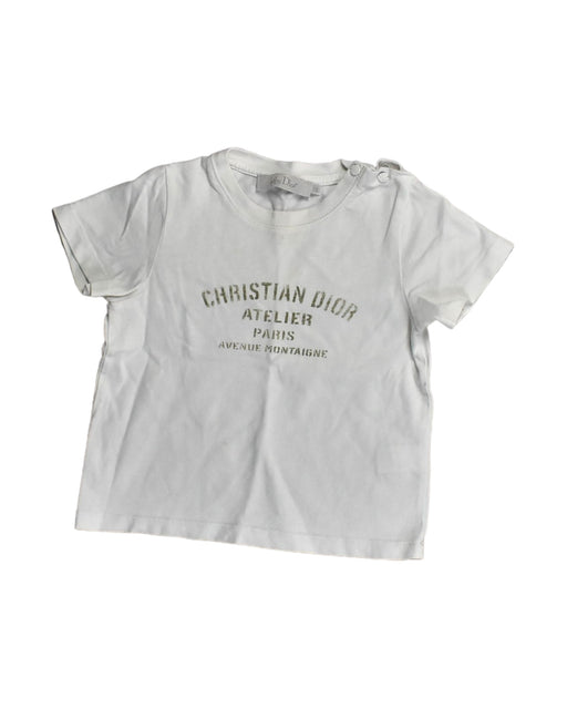 A White T Shirts from Dior in size 6-12M for girl. (Front View)