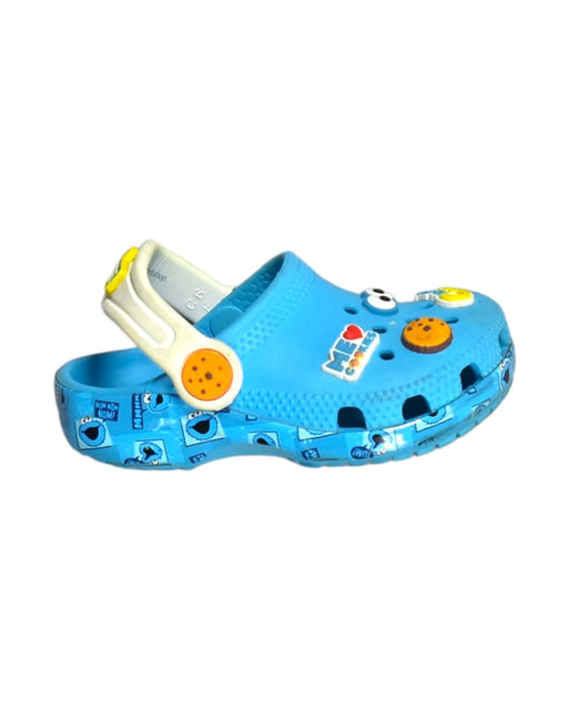 A Blue Sandals from Crocs in size 18-24M for boy. (Front View)