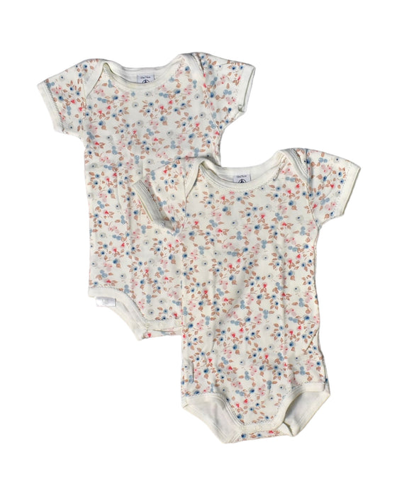 A White Bodysuits from Petit Bateau in size 6-12M for girl. (Front View)