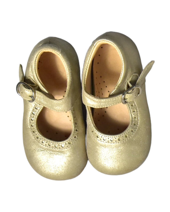 A Gold Flats from Beberlis in size 12-18M for girl. (Back View)