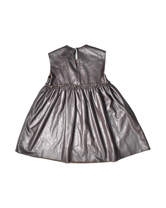 A Black Sleeveless Dresses from Le Petit Coco in size 5T for girl. (Back View)