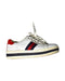 A White Sneakers from Gucci in size 6T for boy. (Front View)