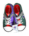 A Green Sneakers from Champion in size Newborn for boy. (Back View)