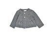 A Grey Cardigans from Pamplemousse in size 6-12M for girl. (Front View)