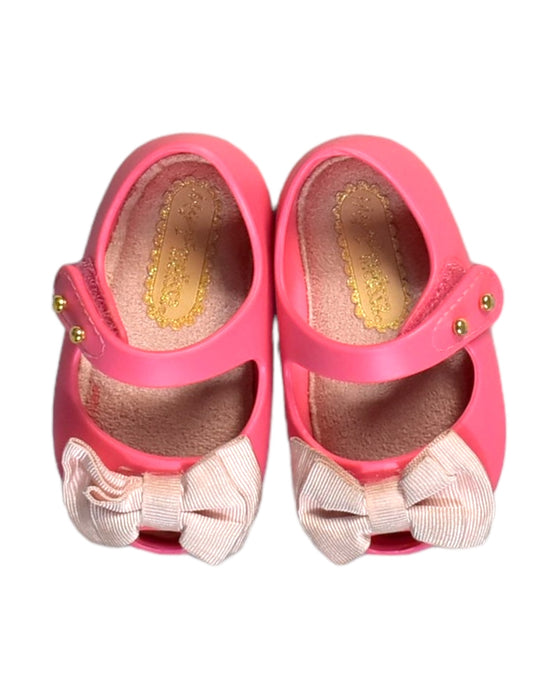 A Pink Slip Ons from Mini Melissa in size 6-12M for girl. (Front View)