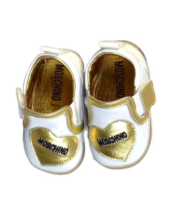 A White Slip Ons from Moschino in size Newborn for girl. (Back View)