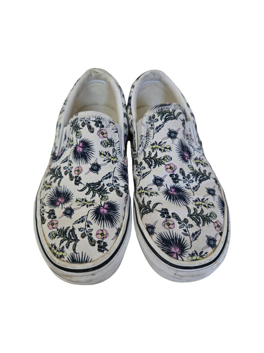 A White Slip Ons from Vans in size 11Y for neutral. (Front View)