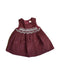 A Burgundy Sleeveless Dresses from The Little White Company in size 0-3M for girl. (Front View)