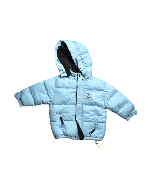 A Blue Puffer/Quilted Jackets from Timberland in size 12-18M for boy. (Front View)