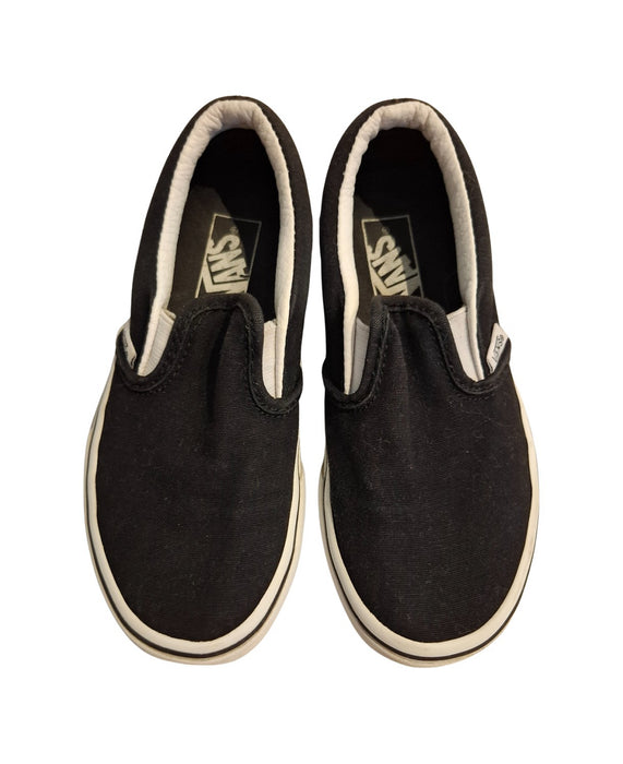 A Black Slip Ons from Vans in size 6T for neutral. (Front View)