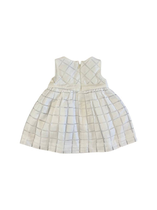 A White Sleeveless Dresses from Mayoral in size 6-12M for girl. (Back View)