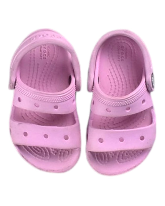 A Pink Sandals from Crocs in size 18-24M for girl. (Front View)