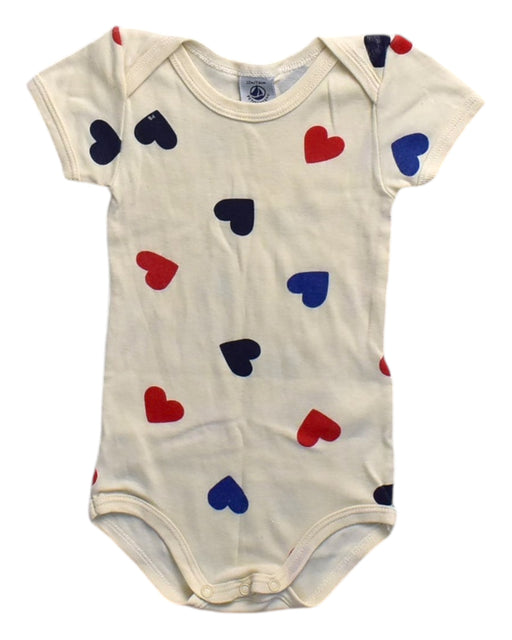 A Beige Short Sleeve Bodysuits from Petit Bateau in size 6-12M for girl. (Front View)