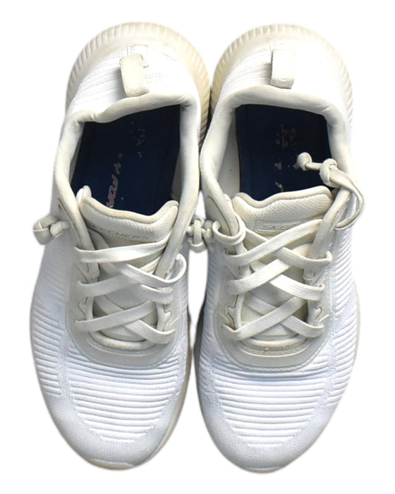 A White Sneakers from Skechers in size 10Y for boy. (Back View)