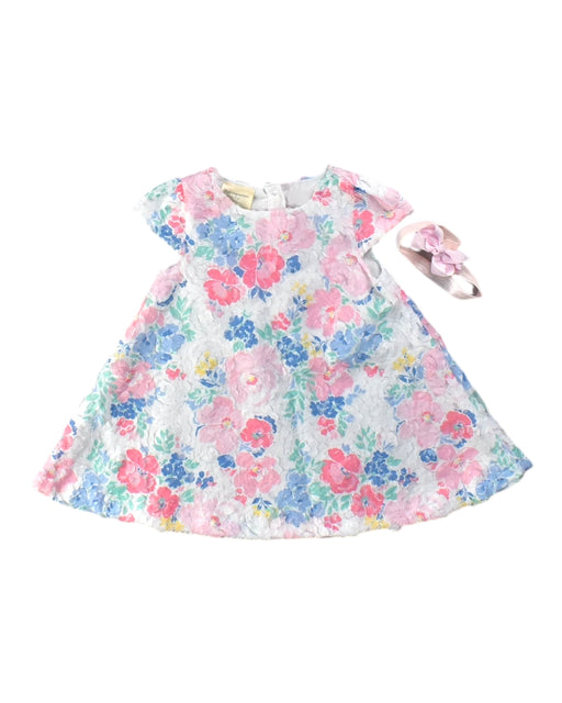 A White Short Sleeve Dresses from First Impressions in size 6-12M for girl. (Front View)