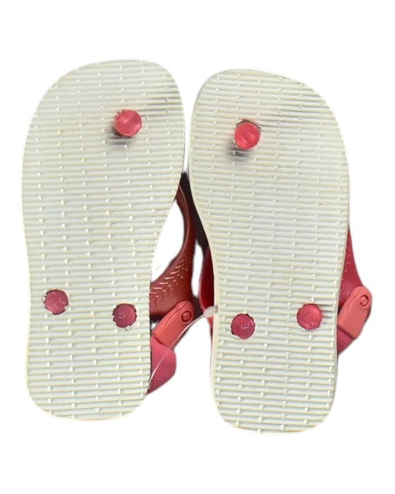 A White Sandals from Havaianas in size 4T for girl. (Back View)