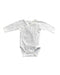 A White Long Sleeve Bodysuits from Petit Bateau in size Newborn for boy. (Front View)