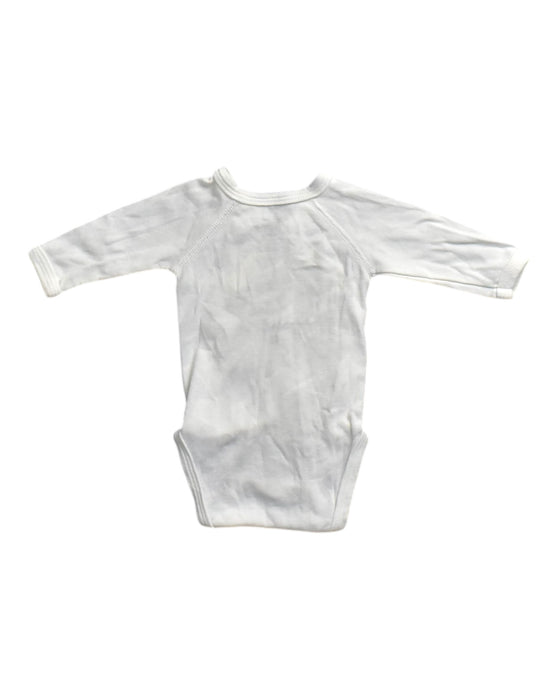 A White Long Sleeve Bodysuits from Petit Bateau in size Newborn for boy. (Back View)