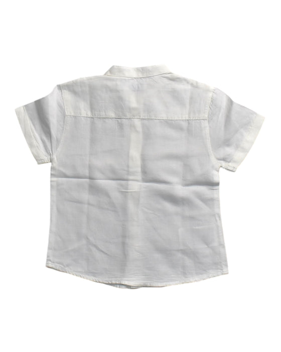 A White Short Sleeve Shirts from Mayoral in size 6-12M for boy. (Back View)