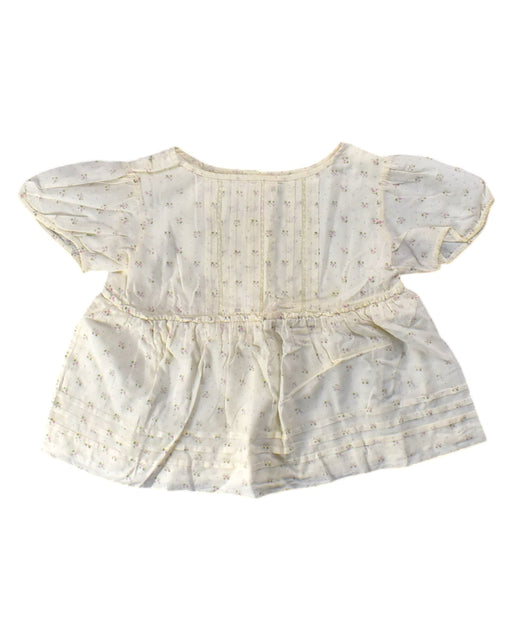 A Ivory Short Sleeve Rompers from Bonpoint in size 4T for girl. (Front View)