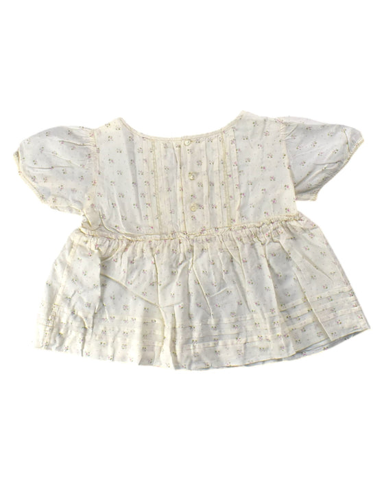 A Ivory Short Sleeve Rompers from Bonpoint in size 4T for girl. (Back View)