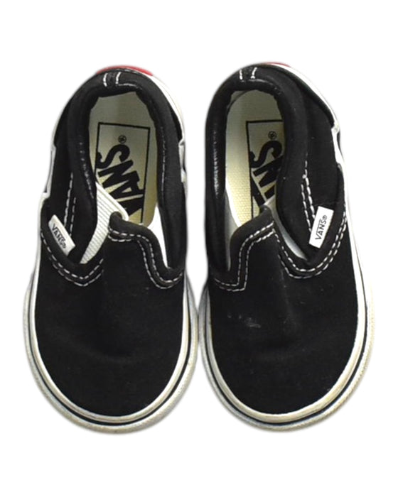 A Black Slip Ons from Vans in size 12-18M for neutral. (Back View)